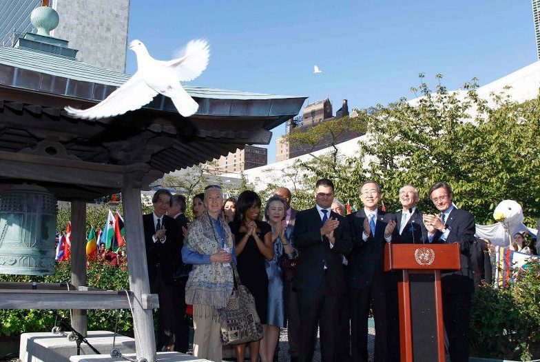 UN-with-peace-bell-and-dove1-e1497200204720
